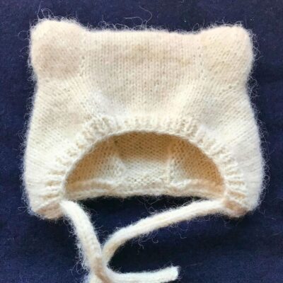 Cómo tejer las orejas de una capotita de bebé a dos agujas